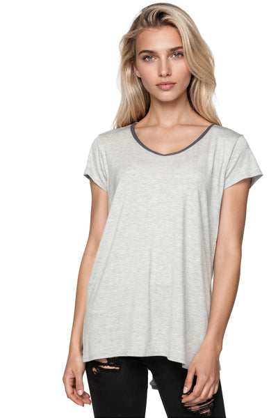 Woman wearing a gray t-shirt with a white background