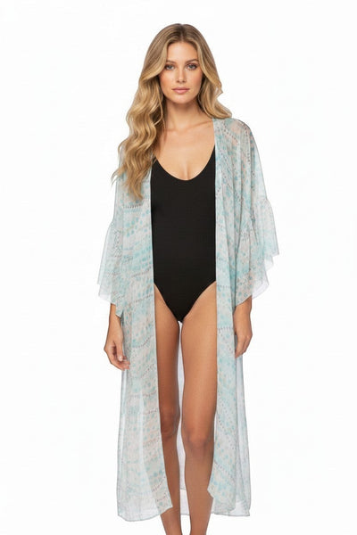 Subtle Luxury long silk kimono coverup featuring a blue geo squared print and flowing bell sleeves on a model.