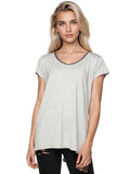 Woman wearing a gray t-shirt with a white background
