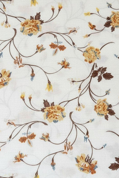 Subtle Luxury wool scarf featuring a delicate white background with a romantic yellow and brown rose floral print.
