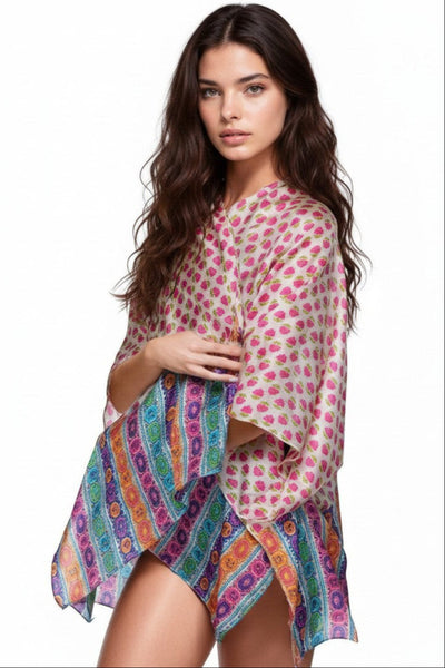 Subtle Luxury silky crop kimono coverup featuring a vibrant pink floral and multi-colored geometric print pattern.