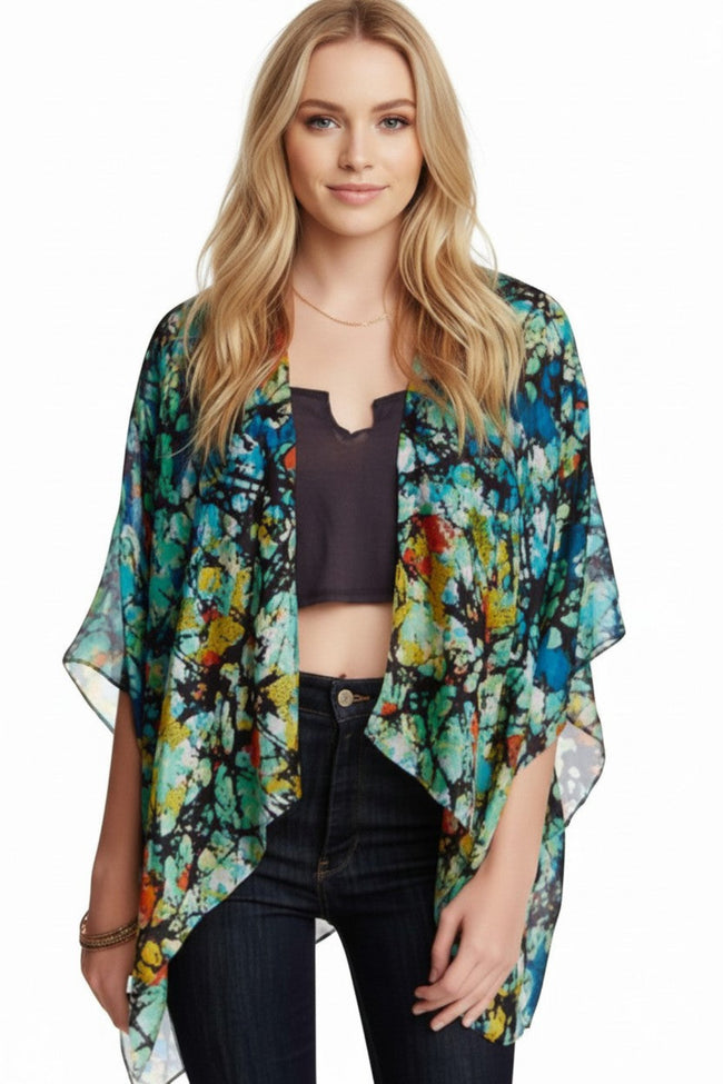 Subtle Luxury silky crop kimono coverup featuring a vibrant multi-color abstract print on a lightweight fabric.