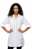Subtle Luxury white cotton boyfriend shirt with electric blue hand-stitched embroidery and rolled sleeves